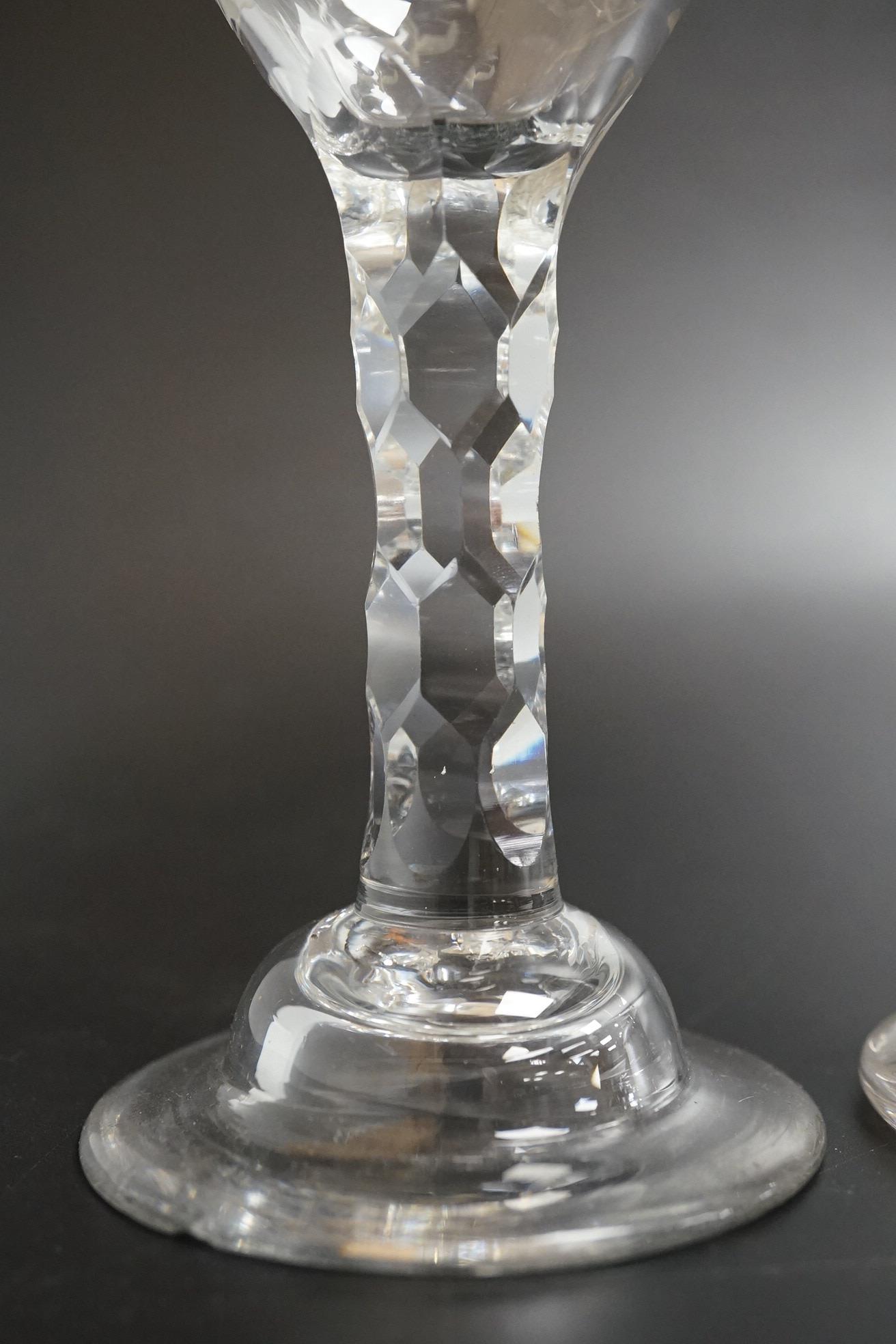An opaque twist firing glass with terraced foot and a faceted wine glass with domed foot, c.1760, tallest 14cm